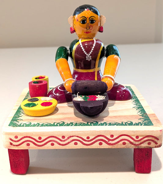 Spice Grinding Woman
