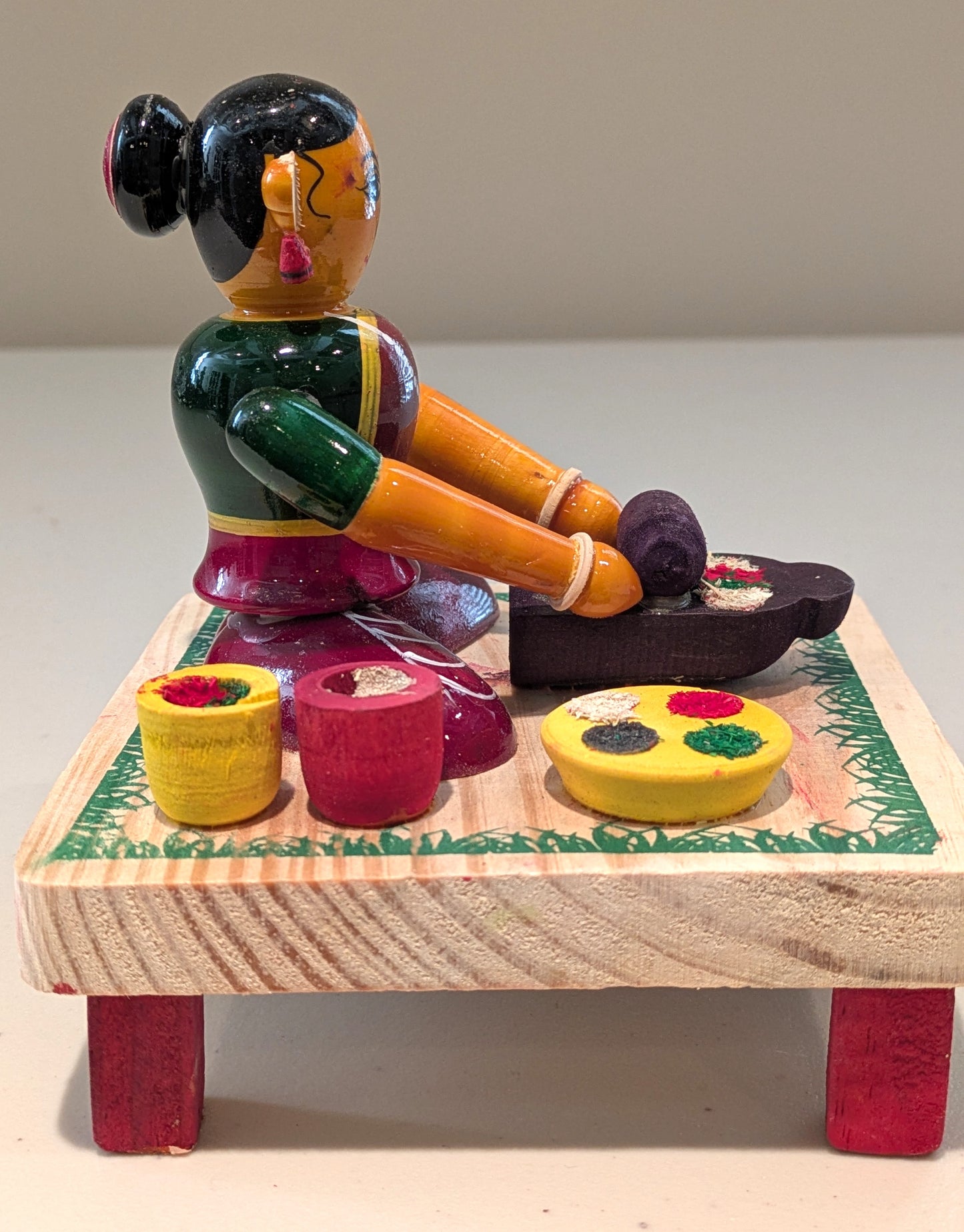 Spice Grinding Woman