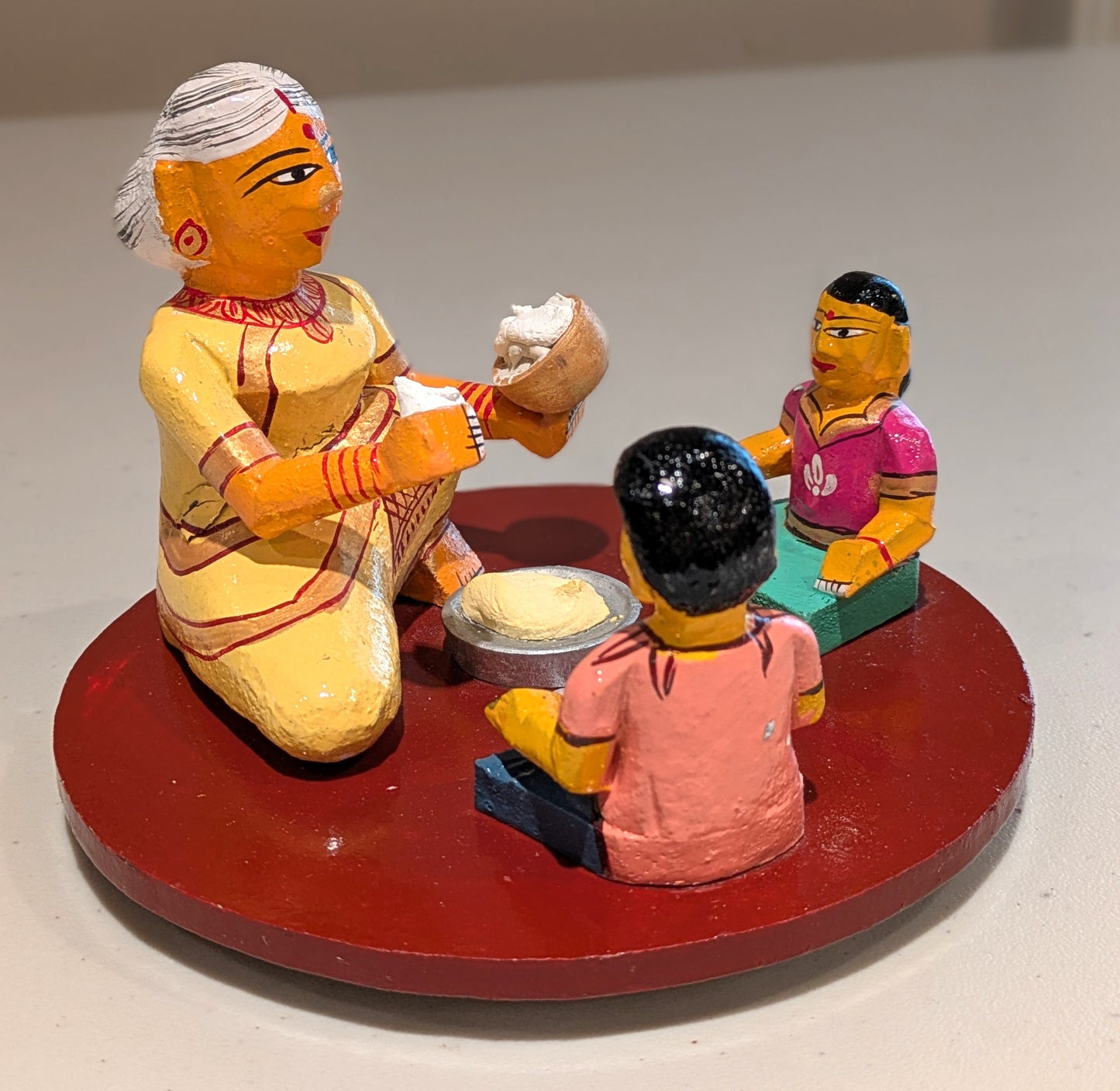 Grandmother (Ammamma) feeding Grandchildren