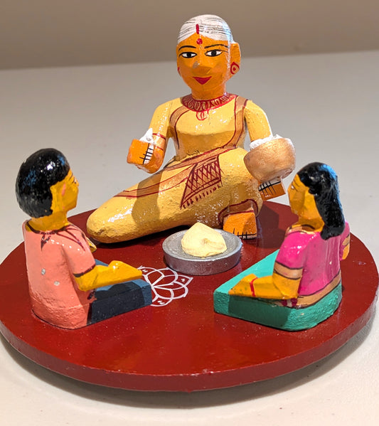 Grandmother (Ammamma) feeding Grandchildren
